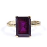A 9ct gold rectangular amethyst solitaire ring, setting height 11.2mm, size O, 2.8g