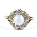 An Edwardian 18ct gold opal and diamond cluster ring, with central high cabochon opal, setting