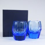 A pair of David Linley facet-cut blue glass tumblers, height 11cm, boxed