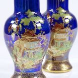 A pair of Carlton Ware blue lustre glaze vases, with gilded Japanese design, circa 1920s, pattern