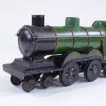 A Vintage tinplate toy carpet steam locomotive, length 32cm