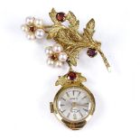 A 9ct gold Rotary fob watch, on a 9ct garnet and pearl flower brooch fitting, height 44.5mm, 10.5g