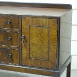 A Heal's 1920s walnut sideboard, parcel ebonised edges, with ebony and bone handles, maker's label