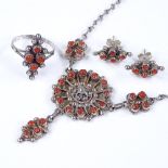 An Eastern silver and coral jewellery set, including necklace, ring and earring, ring size R,