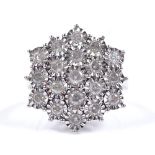 A 9ct white gold diamond cluster panel ring, total diamond content approx 1ct, panel height 20.