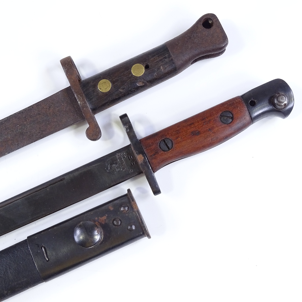 2 early 20th century sword bayonets, 1 with scabbard