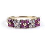 A 9ct gold ruby and diamond flower dress ring, setting height 4.8mm, size L, 1.9g