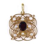 An unmarked gold garnet and pearl openwork pendant, settings topped with filigree, tests as 22ct