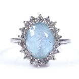 An unmarked white gold aquamarine and diamond cluster ring, setting height 15mm, size M, 4.3g
