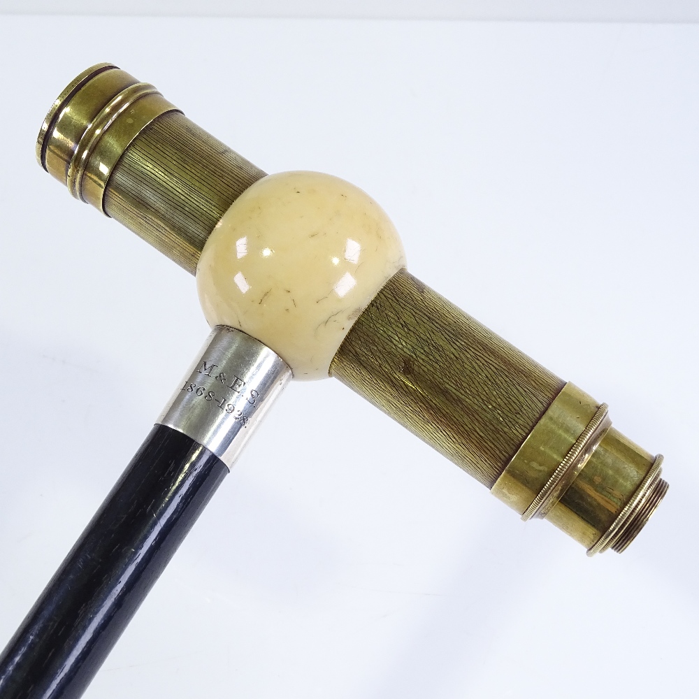 A rare ivory and brass telescope-handled walking cane, the ivory ball top enclosing a brass 2-draw - Image 2 of 3