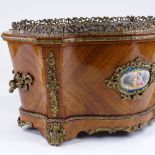 A 19th century French kingwood planter of serpentine-shaped rectangular form, with cast-ormolu