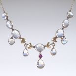 An 9ct gold moonstone and ruby collar necklace...18ct gold chain