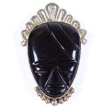A Mexican sterling silver and onyx mask brooch, height 69.7mm, 32.7g