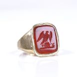 A large unmarked gold carnelian seal ring, with closed back setting, setting height 16mm, size I,