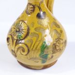 A Turkish Canakkale yellow glaze pottery ewer, height 23cm