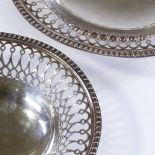 A pair of silver oval bon bon baskets, with pierced border, on raised gallery, by Edward Barnard &