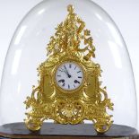 An ornate 19th century French gilt-metal cased 8-day mantel clock under glass dome, overall height