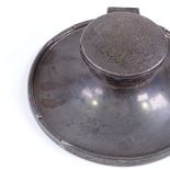 A George V circular silver Capstan inkwell, with glass liner, by A&J Zimmerman, hallmarks Birmingham