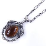 A Georg Jensen Danish sterling silver and brown stone pendant necklace, model no. 2014, pendant