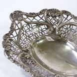 A Victorian silver bon bon dish, with foliate and floral border, and ornate pierced edge, by William