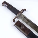 A 19th century Enfield sword bayonet with original leather scabbard