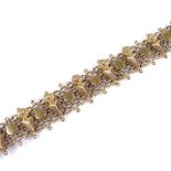 An 18ct gold mesh daisy design necklace, length 42cm, 32.2g