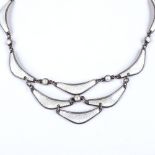 A Norwegian sterling silver and white enamel collar necklace, with engine turned decoration and