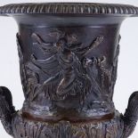 A 19th century patinated and gilded cast-bronze campana form 2-handled urn, with Classical relief