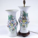A pair of Chinese porcelain vases, with painted figures and gardens, height 37cm