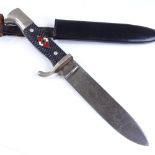 A German Second War Period Hitler Youth knife, with motto on blade and metal scabbard