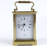 A Mappin & Webb brass-cased carriage clock, in original leather travelling case