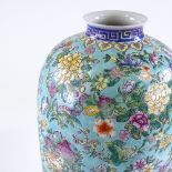 A Chinese porcelain vase, with painted enamel floral decoration, height 45cm
