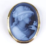 A relief carved cameo brooch/pendant, depicting female portrait, in 9ct gold frame, height 32.8mm,
