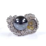 An unmarked white gold whole pearl and diamond cocktail ring, circa 1970s, setting height 17.8mm,