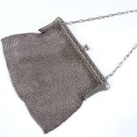 A silver plated mesh evening purse, with pierced arrow mounts, width 17cm