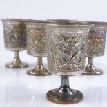 A set of 5 sterling silver drinking tots, with relief embossed floral decoration, height 7cm, 4.4oz