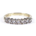 A 9ct gold 7-stone diamond half eternity ring, setting height 3.6mm, size N, 2.4g
