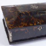 A 19th century rectangular tortoiseshell jewel box, with shaped lid and unmarked silver hinges and