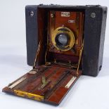 A Victorian leather-bound mahogany and brass-mounted Sanderson roll film camera