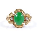 An 18ct gold 3-stone green stone and diamond dress ring, with engraved openwork shoulders, setting
