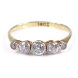 An 18ct gold 5-stone graduated diamond ring, with collet set diamonds, setting height 3.9mm, size M,