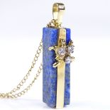 An 18ct gold lapis lazuli and diamond cuboid pendant necklace, on 18ct chain, pendant height 33.8mm,