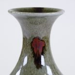 Poh Chap Yeap (1927 - 2007), porcelain vase with flared rim, green speckle glaze and running iron