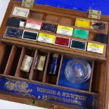 A Victorian Winsor & Newton mahogany artist's box with fitted interior, single drawer below and
