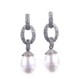 A pair of Art Deco style 18ct white gold pearl and diamond drop earrings, height excluding fitting