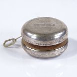 A Tiffany & Co sterling silver-mounted yoyo, commemorating the Florida State Seminoles football