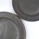 2 large Antique pewter chargers, largest 38cm diameter