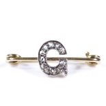 An unmarked gold rose-cut diamond G initial bar brooch, length 31.1mm, 2.7g