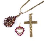 Various gold jewellery, including garnet pendant on 14ct gold chain, 18ct ruby heart pendant, and