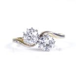 An 18ct gold 2-stone diamond crossover ring, each diamond approx 0.75ct, total diamond content